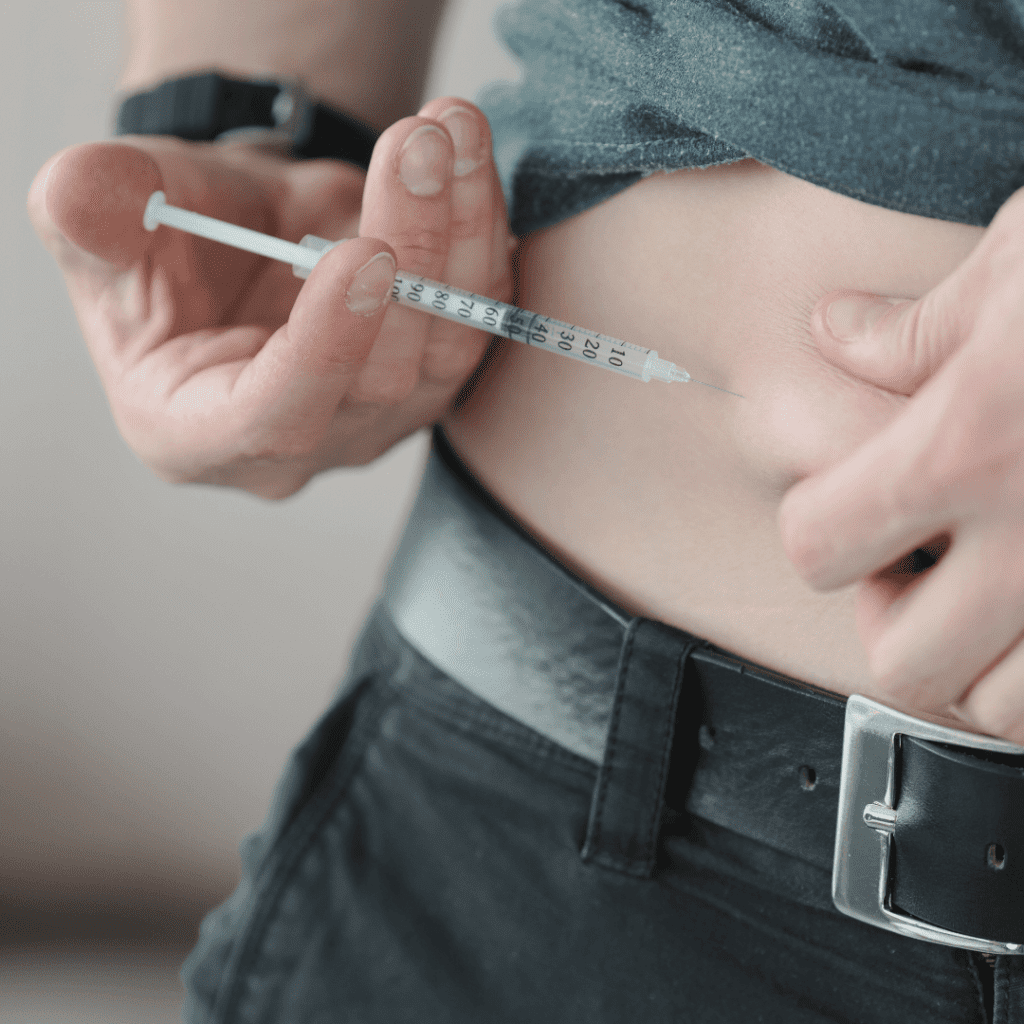 man using tirzepatide injection for weight loss