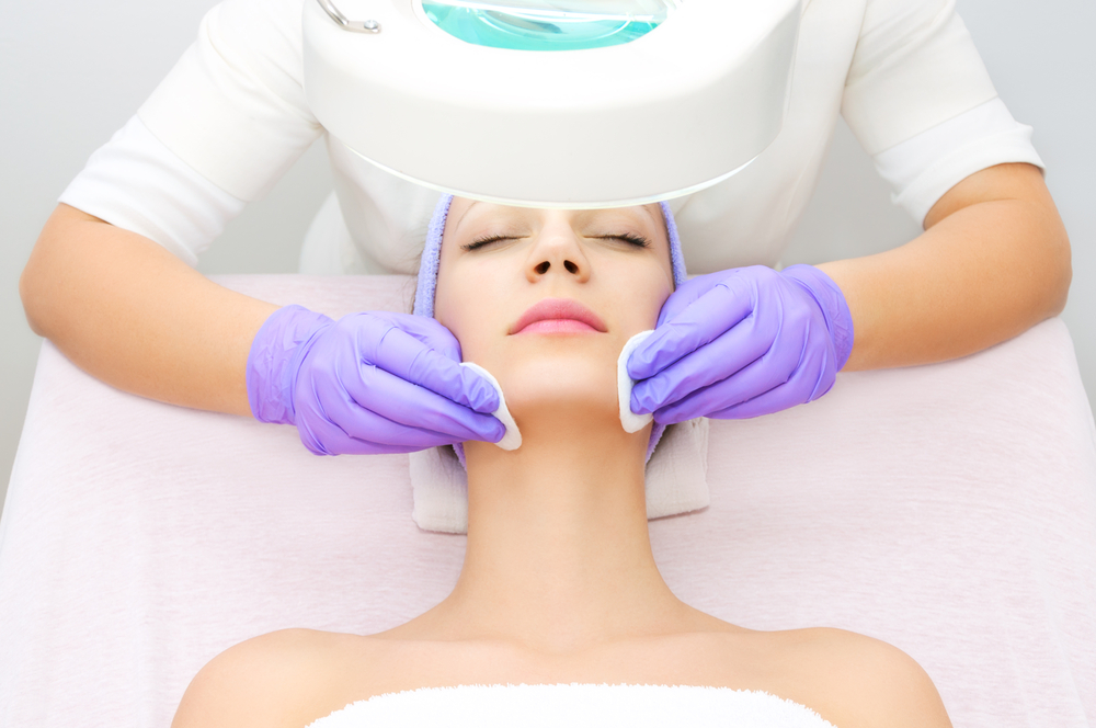 women receives facial treatment for better skincare